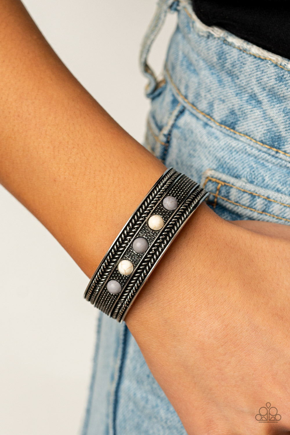 Quarry Quake - Silver - White - Gray Cuff Bracelet - Paparazzi Accessories - Dainty white and Sleet stone beads are encrusted along the front of an ornate silver cuff studded and embossed in antiqued rope-like patterns. Sold as one individual bracelet.