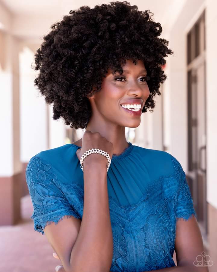 Seize the Sizzle - White Icy Rhinestone - Silver Bracelet - Paparazzi Accessories - Set in pronged silver settings, pairs of icy white rhinestones haphazardly stack around the wrist in sizzling rows of shimmer. Features an adjustable clasp closure. Sold as one individual bracelet.
