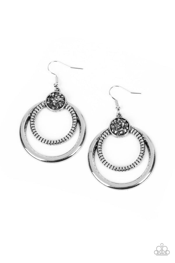 Spun Out Opulence - Silver Hematite Rhinestone Earrings - Paparazzi Accessories - Smooth and textured silver hoops connect to the bottom of a silver fitting embellished in smoky and hematite rhinestones, creating a dizzying lure. Earring attaches to a standard fishhook fitting.
