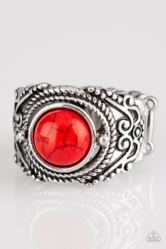 Stand Your Ground - Red and Silver Ring - Paparazzi Accessories - A fiery red stone is pressed into an ornate silver band radiating with rope-like and studded textures for a seasonal look. Features a stretchy band for a flexible fit stylish ring.