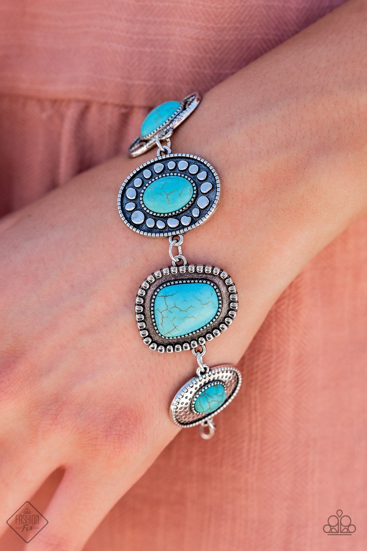 Taos Trendsetter - Blue Turquoise Stone Bracelet - Paparazzi Accessories - An earthy collection of irregular shaped turquoise stones are each pressed into distinctive antiqued silver frames. Each frame showcases a unique pattern of studded and dotted texture resulting in an artisanal vintage vibe as it falls around the wrist.