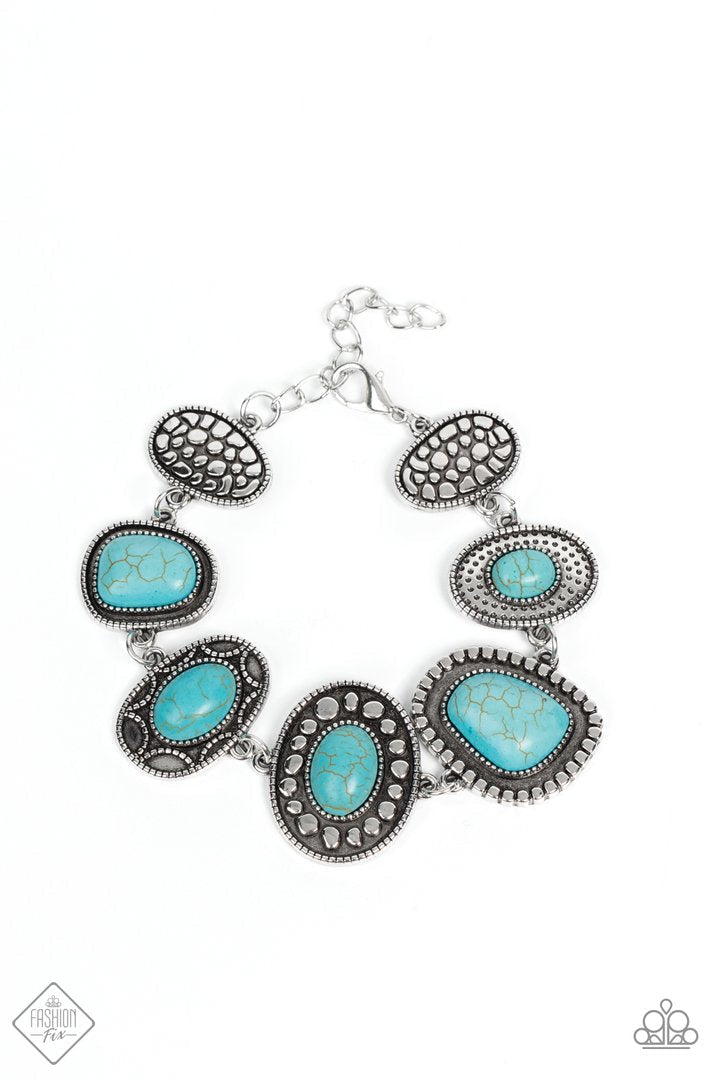 Taos Trendsetter - Blue Turquoise Stone Bracelet - Paparazzi Accessories - An earthy collection of irregular shaped turquoise stones are each pressed into distinctive antiqued silver frames. Each frame showcases a unique pattern of studded and dotted texture resulting in an artisanal vintage vibe as it falls around the wrist.