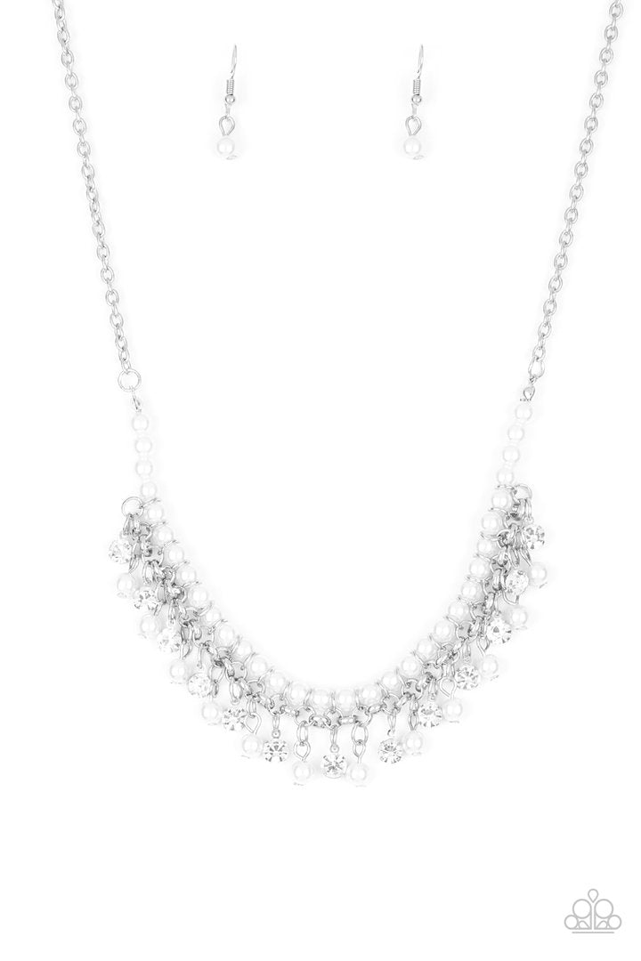 Touch of CLASSY - White and Silver Necklace - Paparazzi Accessories - Infused with silver chain, classic white pearls are threaded along an invisible wire below the collar. Matching white pearls and glittery white rhinestones swing from the pearly strand, creating a flirtatious fringe below the collar. Features an adjustable clasp closure.