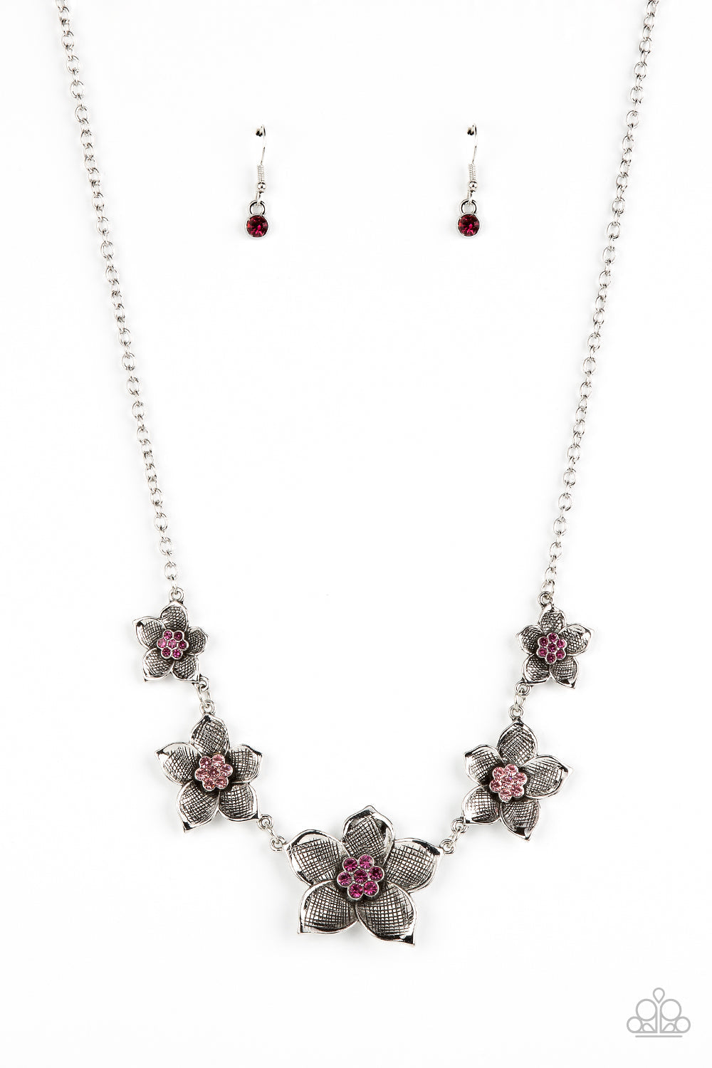 Wallflower Wonderland - Pink and Silver Necklace - Paparazzi Jewelry - Bejeweled Accessories By Kristie - Charming collection of antiqued silver flowers in diminishing sizes delicately link across the collar. The detailed petals are etched in antiqued silver and fan out from lovely pink rhinestone centers resulting in a blissful enchantment fashion necklace.