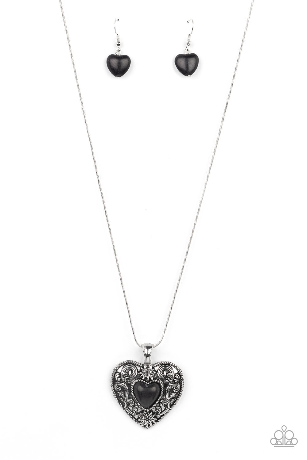 Wholeheartedly Whimsical - Black and Silver Necklace - Paparazzi Accessories - Embossed in whimsical flowers and vines, a rustic silver heart frame is adorned with a black stone heart center for an adoring artisan finish as it glides along a rounded silver snake chain across the chest. Features an adjustable clasp closure.