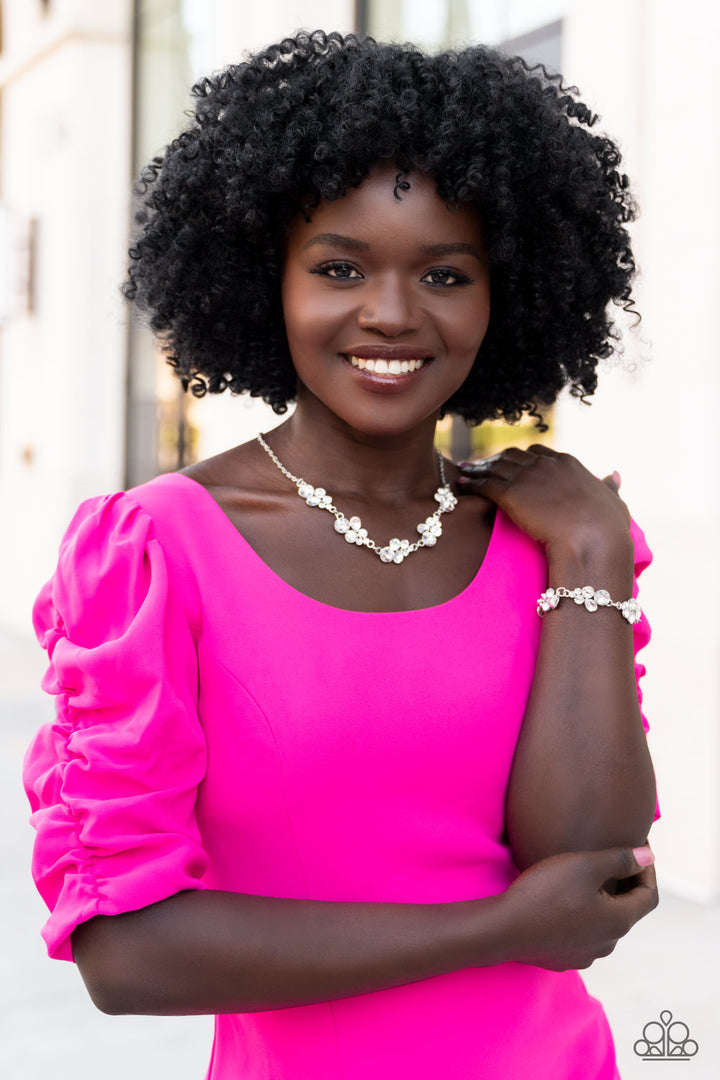 Wife of the Party - Silver Necklace - Paparazzi Accessories - Encased in sleek silver fittings, a bubbly collection of teardrop and round white rhinestones delicately connect into clustered frames below the collar for a sparkly, statement-making finish.