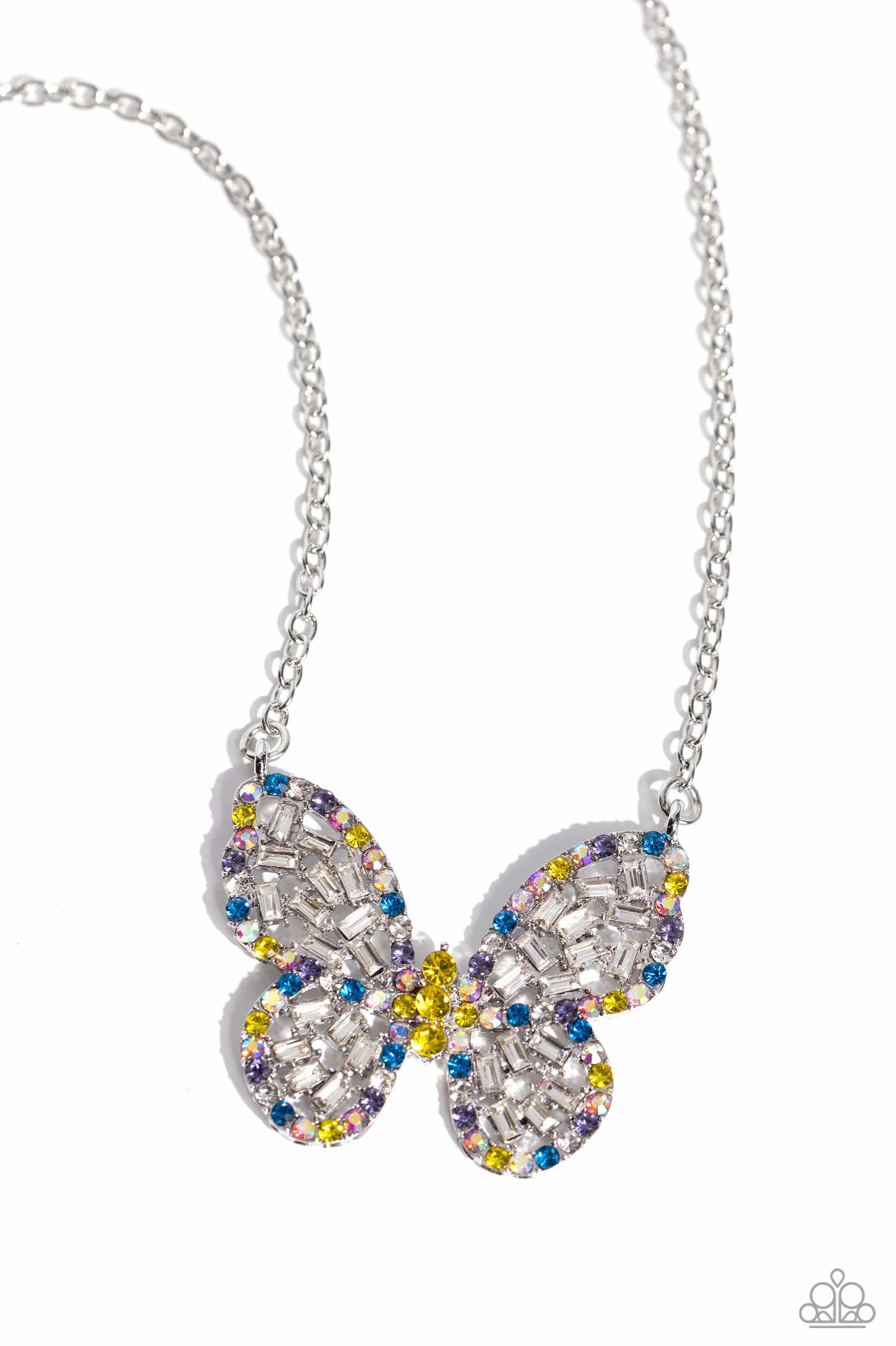 Aerial Academy - Yellow Iridescent Butterfly Necklace - Paparazzi Accessories - Bordered in multicolored and iridescent rhinestones, a collection of white emerald-cut dainty gems scatter across the interior of the airy silver butterfly. Additional dainty yellow rhinestones create the body of the butterfly for a further splash of color and whimsy.