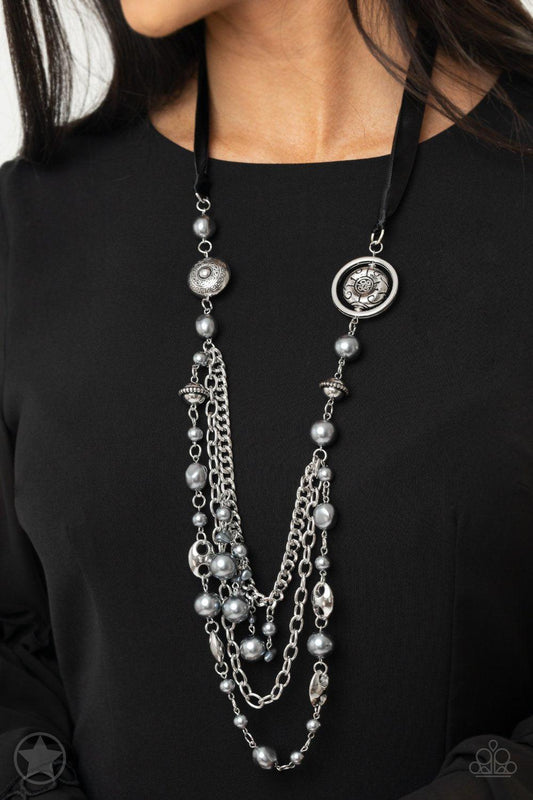 All The Trimmings - Black Necklace - Paparazzi Accessories - A silky black ribbon replaces a traditional chain to create a timeless look. Pearly dark gray beads and funky silver pieces intermix with varying lengths of silver chains to give a fresh take on a Victorian-inspired piece. Sold as one individual necklace.