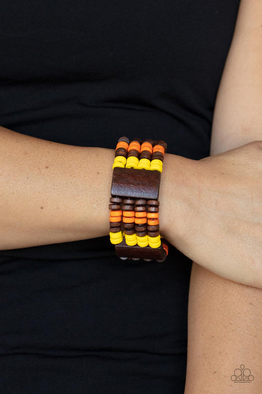 Aruba Attire - Multi Color - Wood Bracelet - Paparazzi Accessories - Rows of earthy brown, Illuminating, and Burnt Orange wooden discs join rectangular brown wooden frames along stretchy bands around the wrist for a simply seasonal look. Sold as one individual bracelet.