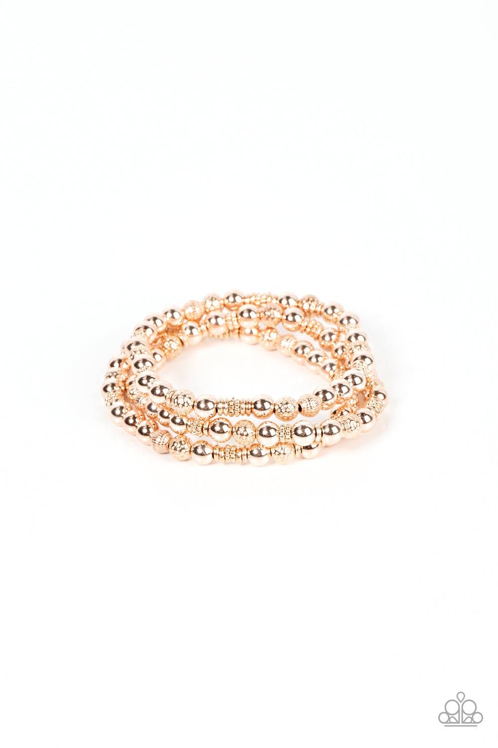 Boundless Boundaries - Rose Gold Stretchy Bracelet - Paparazzi Accessories - A shiny collection of smooth, studded, and textured rose gold beads are threaded along stretchy bands around the wrist, creating dainty layers. Sold as one set of three bracelets.