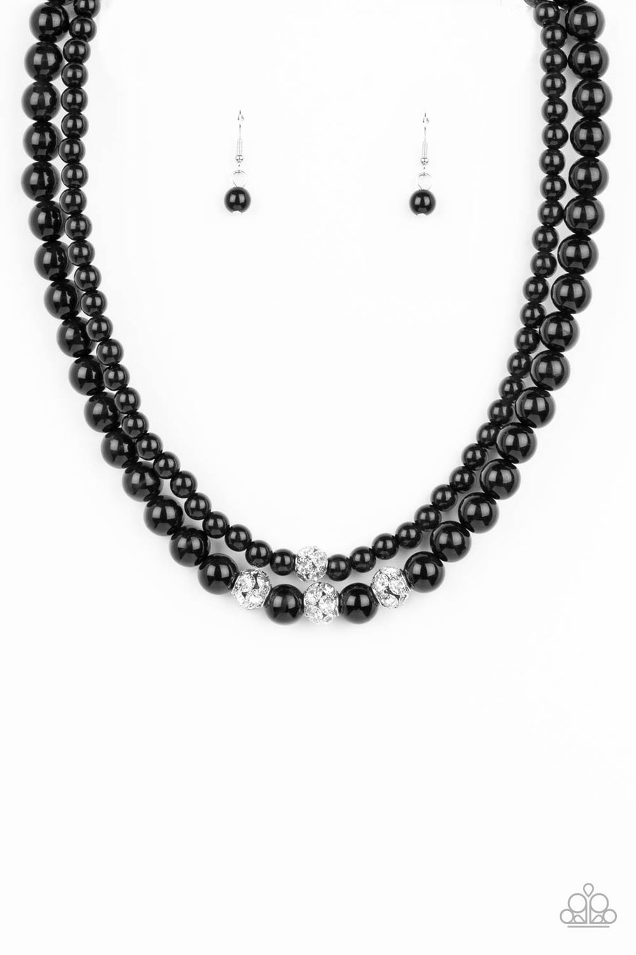 Brilliant Ballerina - Black Necklace - Paparazzi Accessories - Two strands of classic black beads in varying sizes coalesce around the collar in a refined fashion. Silver beads, encrusted in white rhinestones, introduce shimmery detail to each layer, adding a playful spark of shimmer to the timeless design.