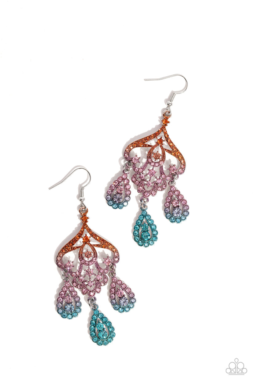 Chandelier Command - Multi Color Earrings - Paparazzi Accessories - Three rhinestone-encrusted teardrops drip from the bottom of an ornate decorative frame, creating an elegant fringe. The decorative frame swirls with ombré rhinestones that go from orange to pink to blue shades in varying sizes for a timelessly over-the-top sparkle. Earring attaches to a standard fishhook fitting. Sold as one pair of earrings.