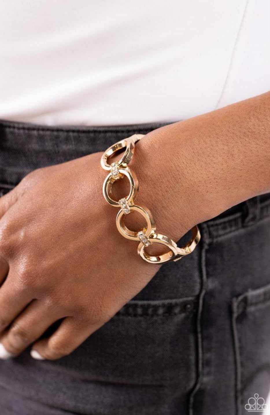 Chic Collection - Gold Bracelet - Paparazzi Accessories - Bold gold hoops, connected by rows of white rhinestone-encrusted frames, link around the wrist for a fierce look. Features a hinged closure. Sold as one individual bracelet.