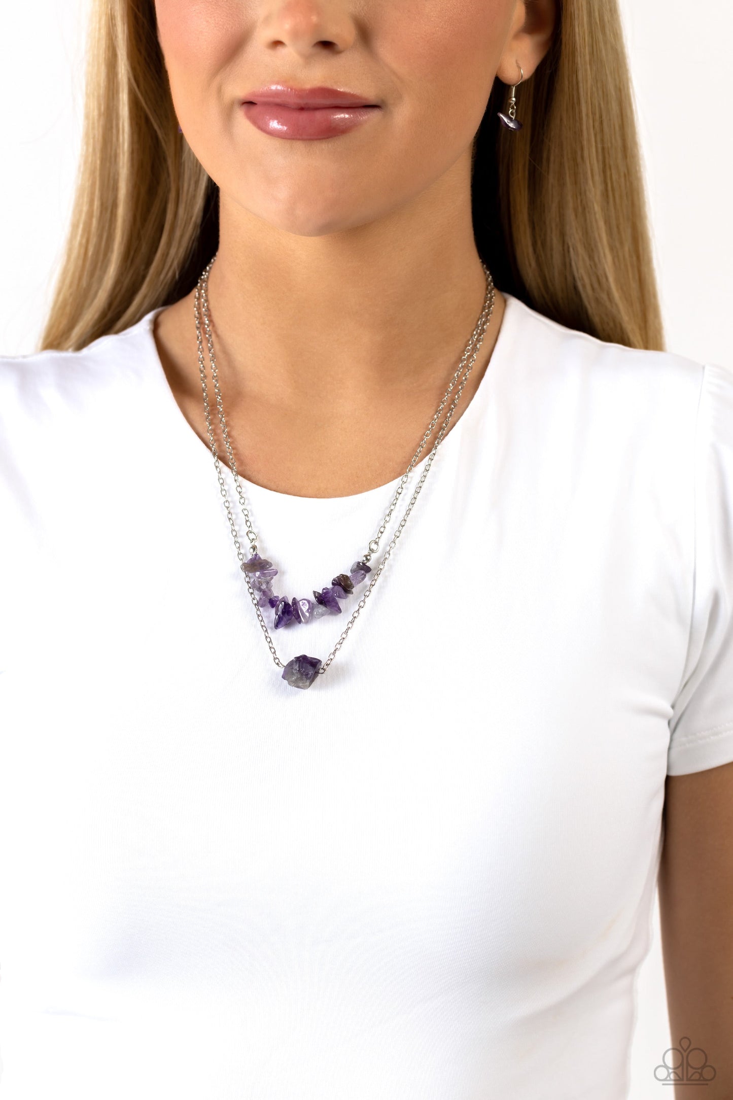Chiseled Caliber - Purple Stone Necklace - Paparazzi Accessories - Chiseled into a natural collection, a layer of amethyst stones gives way to a large, solitaire amethyst stone pendant, creating earthy layers down the chest. Features an adjustable clasp closure.