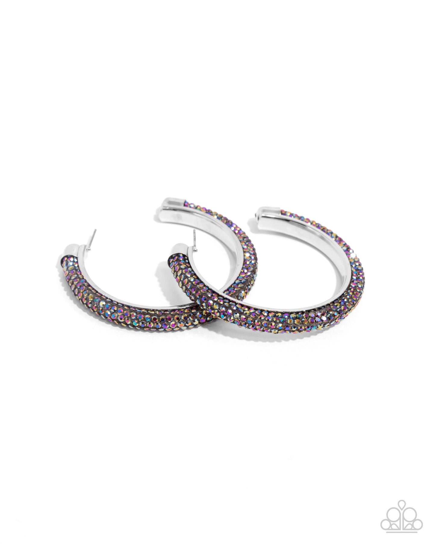 Chiseled Crescendo - Multi Color - Oil Spill Earrings - Paparazzi Accessories - Embellished along the curve of a silver-capped hoop, mesmerizing oil spill rhinestones flicker and flash along the ear for a chiseled confident look. Earring attaches to a standard post fitting. Hoop measures approximately 2 1/2" in diameter.&nbsp;Sold as one pair of hoop earrings.