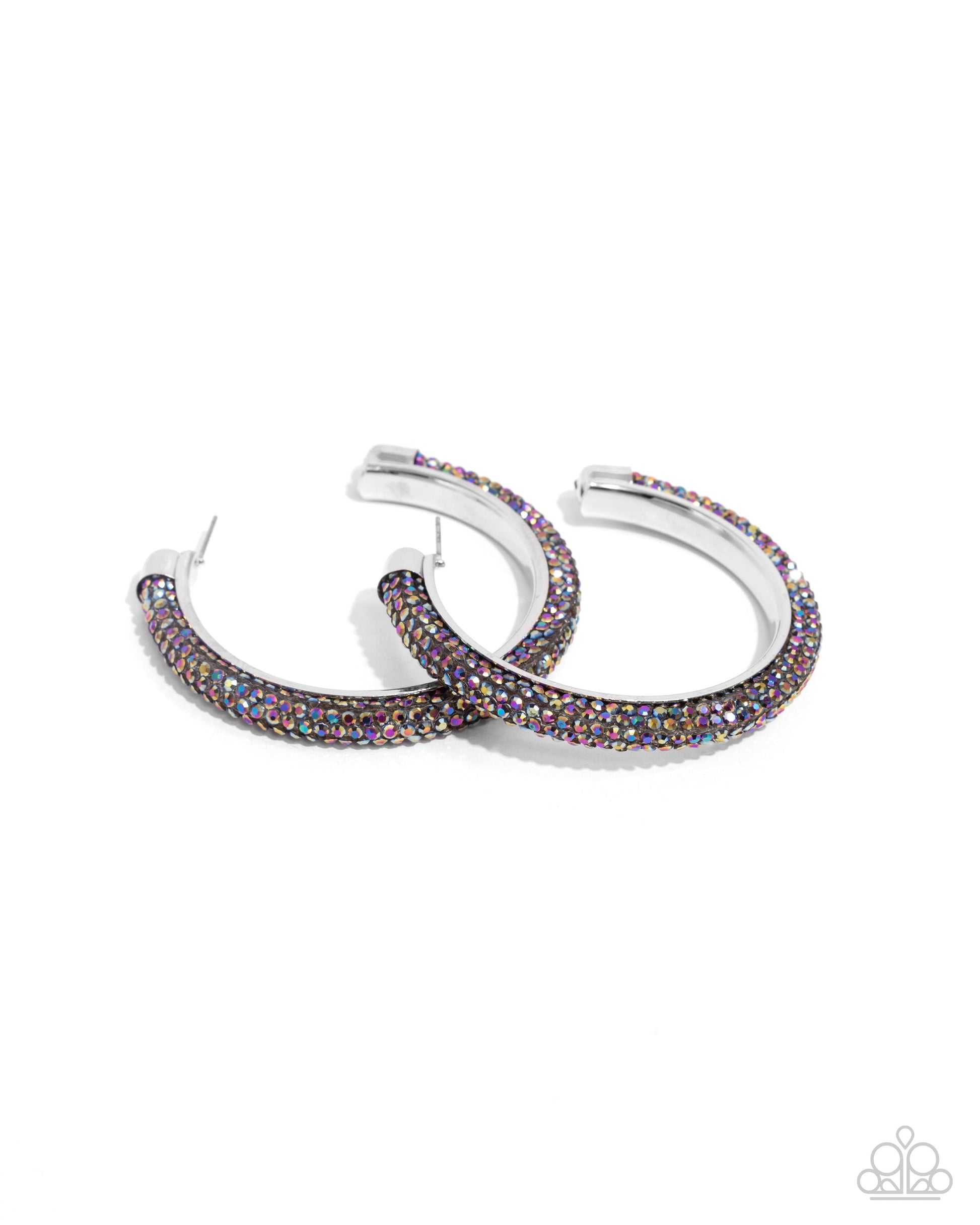 Chiseled Crescendo - Multi Color - Oil Spill Earrings - Paparazzi Accessories - Embellished along the curve of a silver-capped hoop, mesmerizing oil spill rhinestones flicker and flash along the ear for a chiseled confident look. Earring attaches to a standard post fitting. Hoop measures approximately 2 1/2" in diameter.&nbsp;Sold as one pair of hoop earrings.