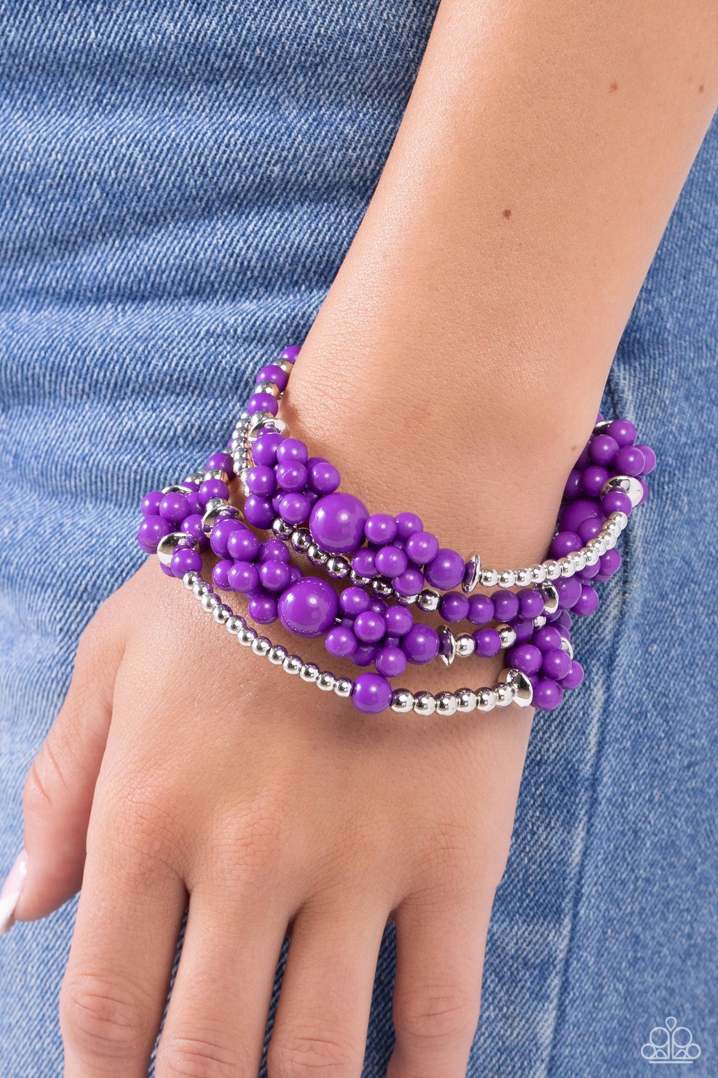 Compelling Clouds - Purple Infinity Wrap Bracelet - Paparazzi Accessories - Strands of sleek silver beads and accents mixed with plum acrylic beads in varying sizes are threaded along an infinity wrap-style bracelet. Clusters of beads are sporadically infused along the design, creating cloud-like, ethereal layers around the wrist.