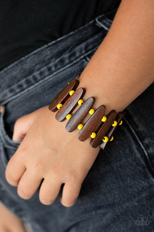 Coronado Cabana - Yellow Bracelet - Paparazzi Accessories - Pairs of sunny yellow wood beads and oblong brown wooden frames alternate along stretchy bands around the wrist for a seasonal pop of color. Sold as one individual bracelet.