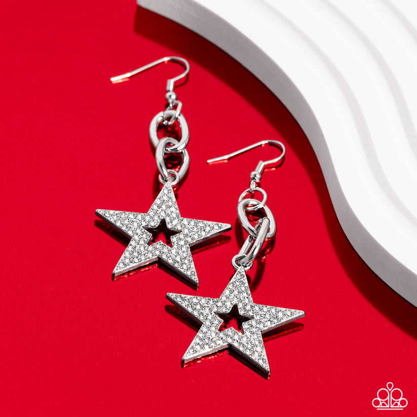 Cosmic Celebrity - Silver and White Star Earrings - Paparazzi Accessories - Glassy white rhinestones scatter across the front of a silver star at the bottom of a chunky silver chain, resulting in a stellar lure. Earring attaches to a standard fishhook fitting. Sold as one pair of earrings.