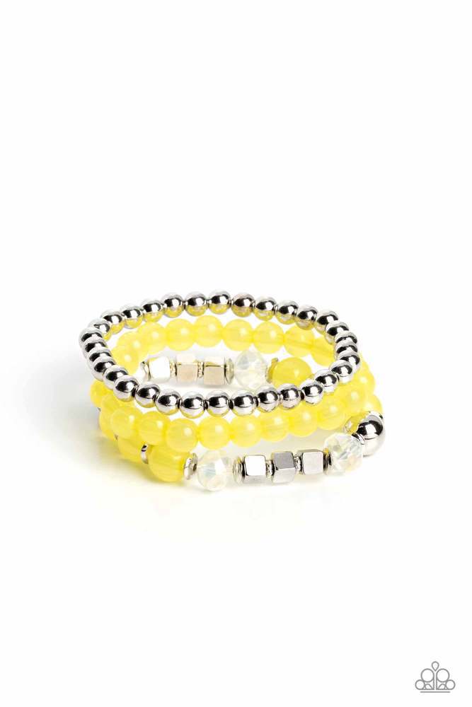 Cube Your Enthusiasm - Yellow Bracelet - Paparazzi Accessories - Varying in shape and size, shiny silver beads, silver cube beads, silver accents, primrose opaque beads, and reflective crystal-like beads are threaded along elastic stretchy bands, creating colorful layers across the wrist. Sold as one set of three bracelets.