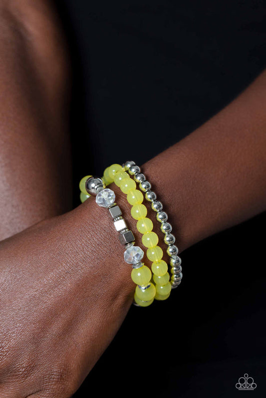 Cube Your Enthusiasm - Yellow Bracelet - Paparazzi Accessories - Varying in shape and size, shiny silver beads, silver cube beads, silver accents, primrose opaque beads, and reflective crystal-like beads are threaded along elastic stretchy bands, creating colorful layers across the wrist. Sold as one set of three bracelets. 