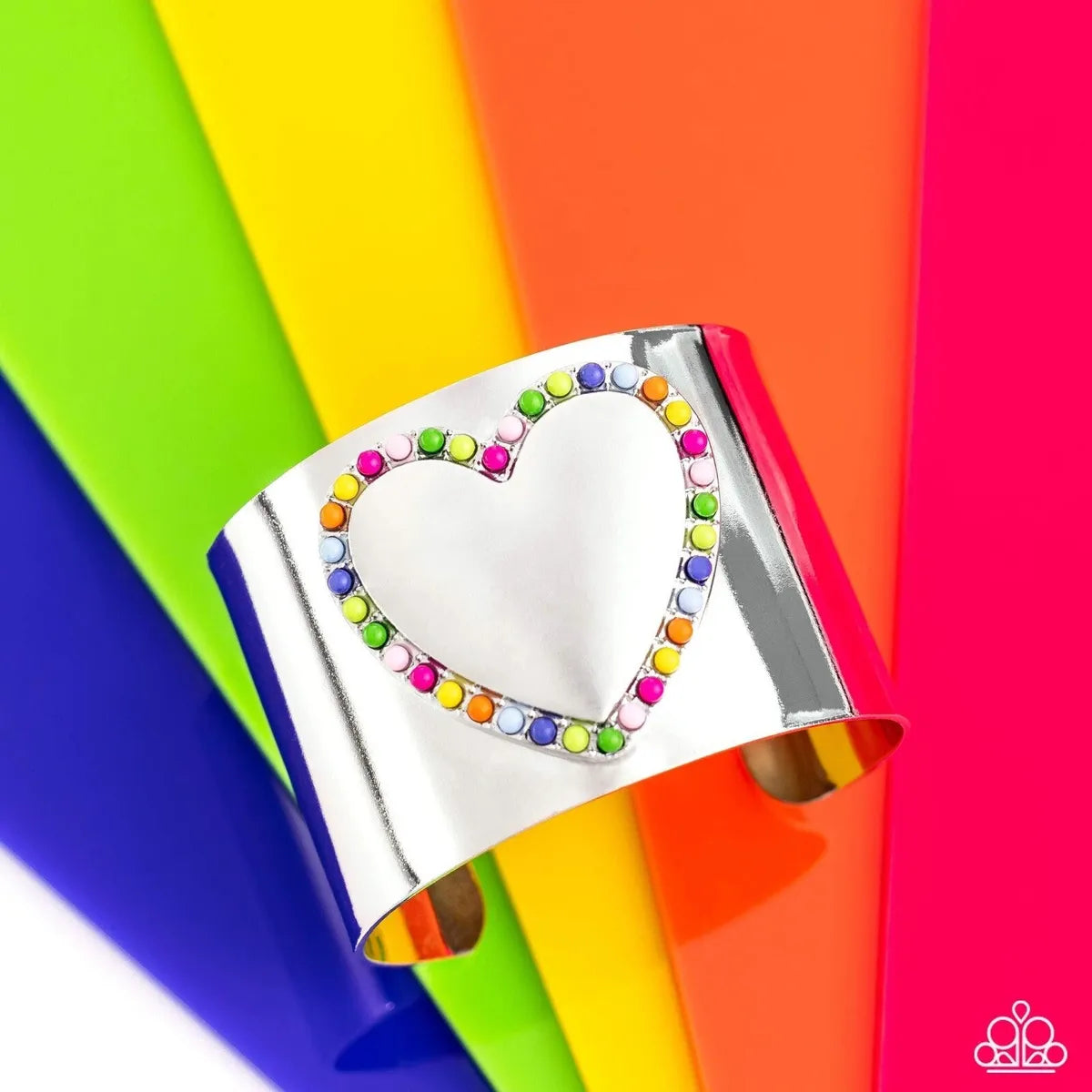 Cuffing Season - Multi Color Cuff Bracelet - Paparazzi Accessories - Featuring Rose Violet, light pink, Classic Green, Kohlrabi, Persian Jewel, Summer Song, High Visibility, red, and orange beads, the center of a thick silver cuff swoops and curls into a charming heart, creating a retro-inspired fashion.