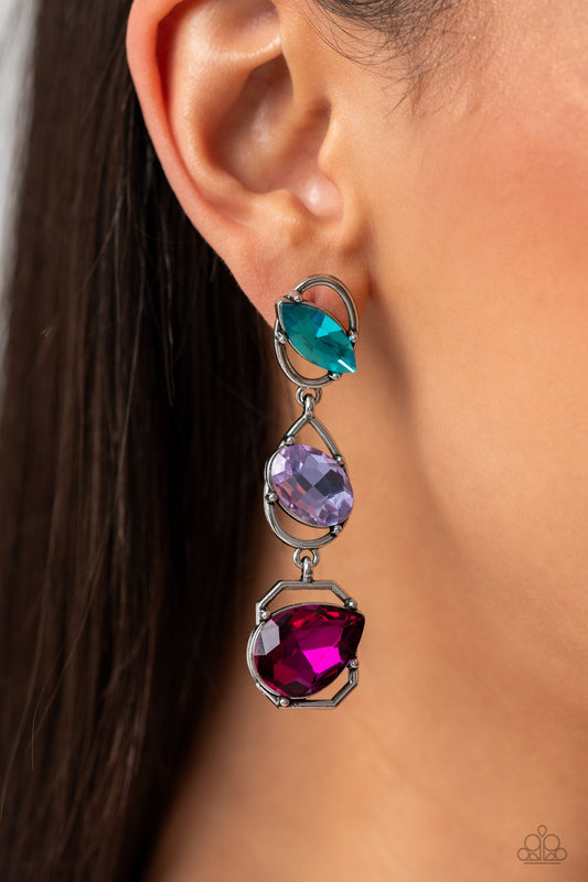 Dimensional Dance - Multi Color Earrings - Paparazzi Accessories - Linking together to create a geometric lure, a sleek silver oval, teardrop, and emerald-cut frame cascade down the ear. Slanted sideways in pronged settings across each frame, a fuchsia teardrop, purple oval-cut, and aquamarine marquise-cut gem create a gorgeous pop of color against the thin edgy frames. Earring attaches to a standard post fitting. Sold as one pair of post earrings.