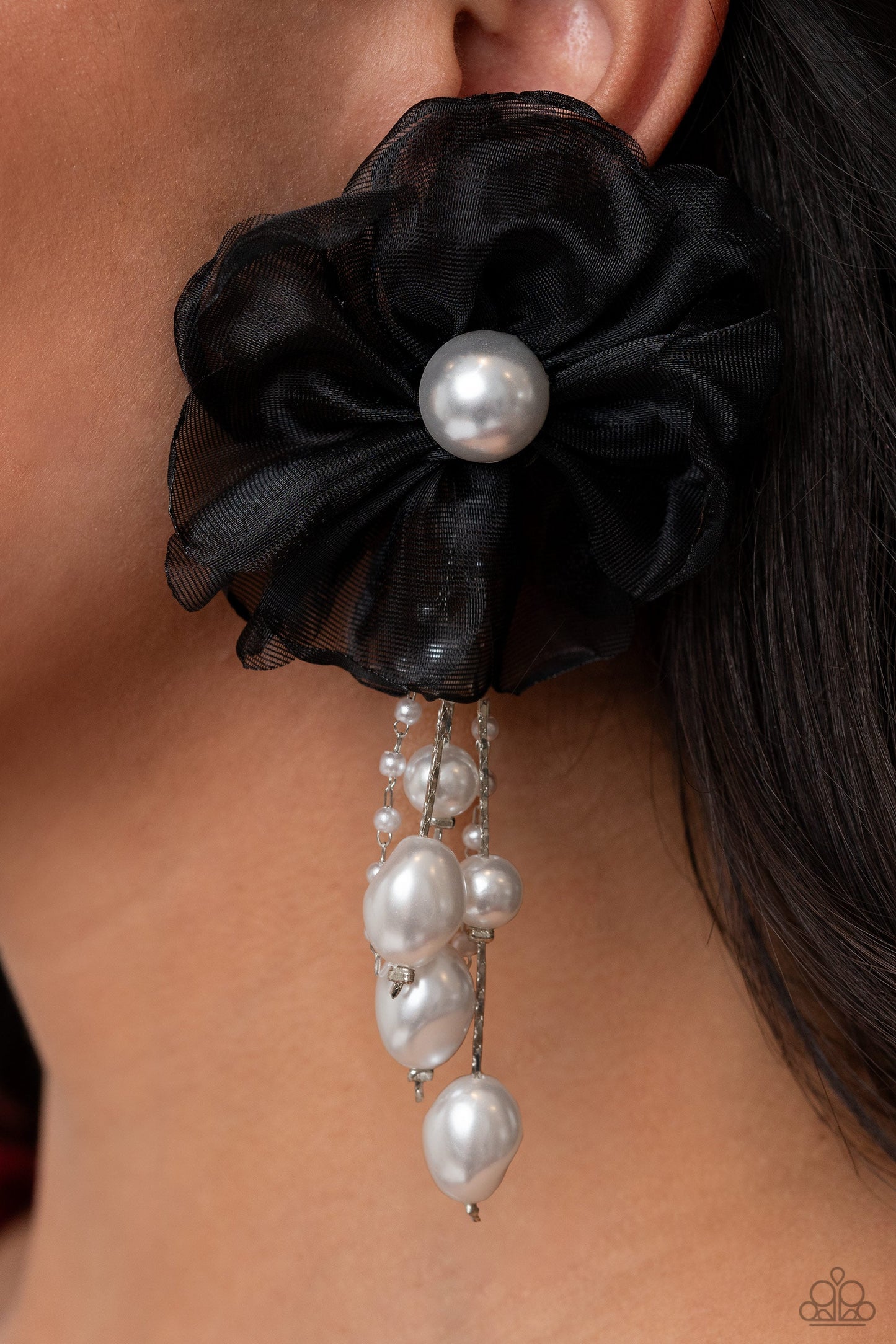 Dripping In Decadence - Black and White Pearl Earrings - Paparazzi Accessories - Folds of black netting gather around a glossy white pearl center, creating a spunky blossom. Cascading from the black netted petals, various white pearls in glossy, baroque, and dainty settings are infused along silver cobra chains for a refined finish. Earring attaches to a standard post fitting. Sold as one pair of post earrings.