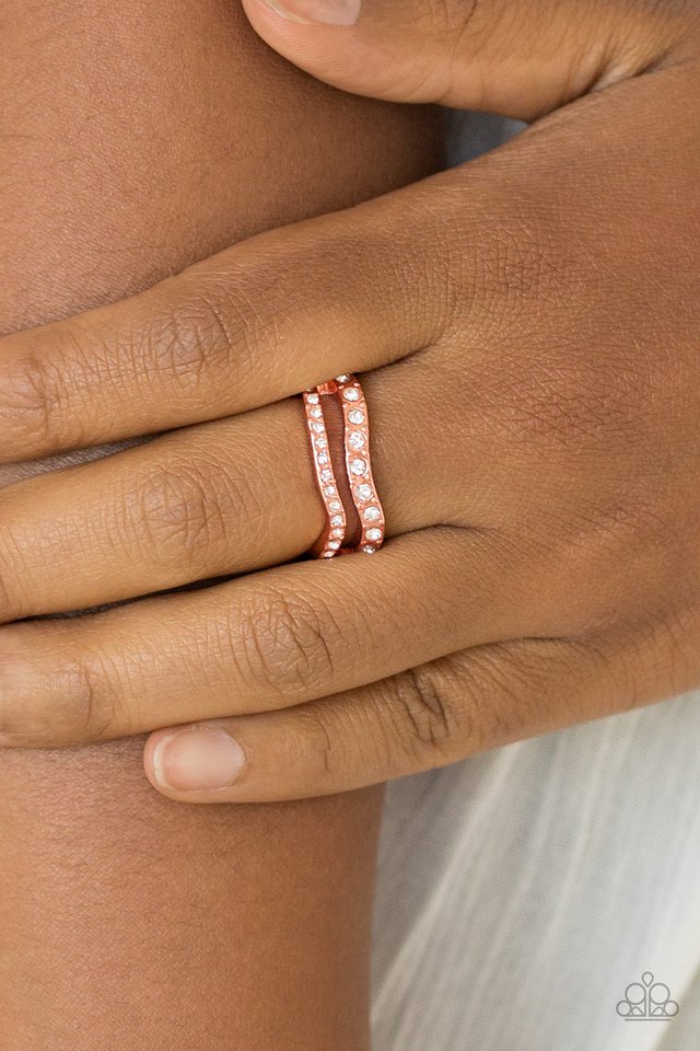 Elite Squad - Copper Ring - Paparazzi Accessories - Glittery white rhinestones are encrusted along waving shiny copper bands for a refined look. Features a dainty stretchy band for a flexible fit. Sold as one individual ring.