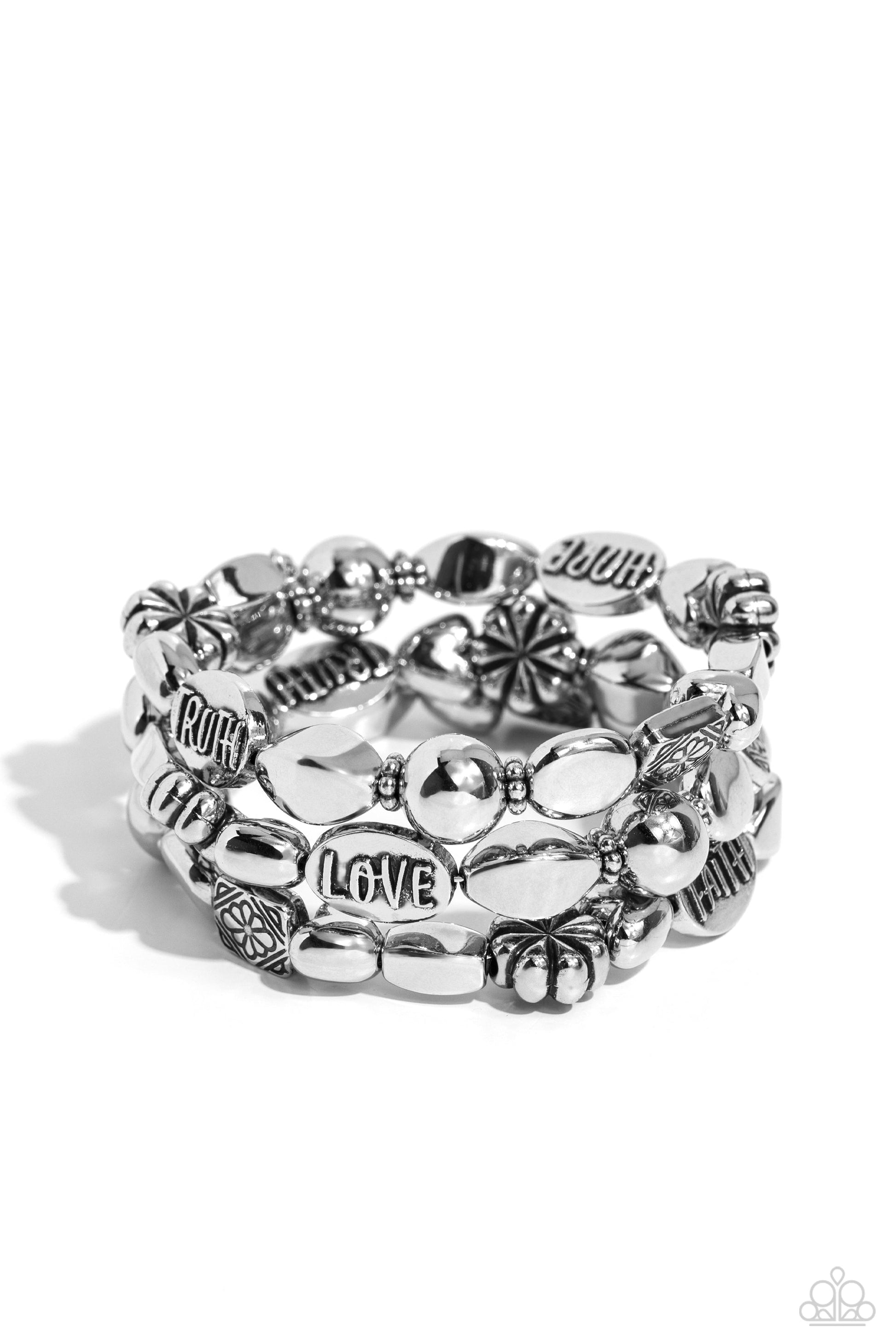 Enchanting Emotion - Silver Infinity Bracelet - Paparazzi Accessories - An enchanting assortment of shiny silver, faceted, and floral embossed beads alternate along a coiled wire, creating a whimsical infinity-style bracelet around the wrist. Additional oval silver beads featuring the words "FAITH," "HOPE," "TRUTH," and "LOVE" finish off the design with an inspirational finish.