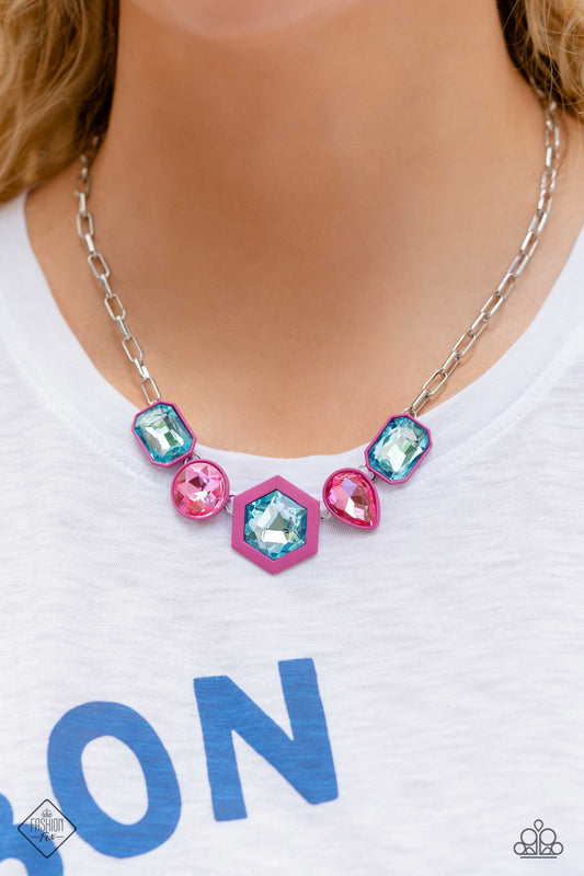 Evolving Elegance - Pink and Blue Necklace - Paparazzi Accessories - Featuring a unique rubber-like backdrop in a vibrant hue of Rose Violet, a collection of oversized gems in light blue and bright pink links below the collar on a silver paperclip chain for a jaw-dropping statement.