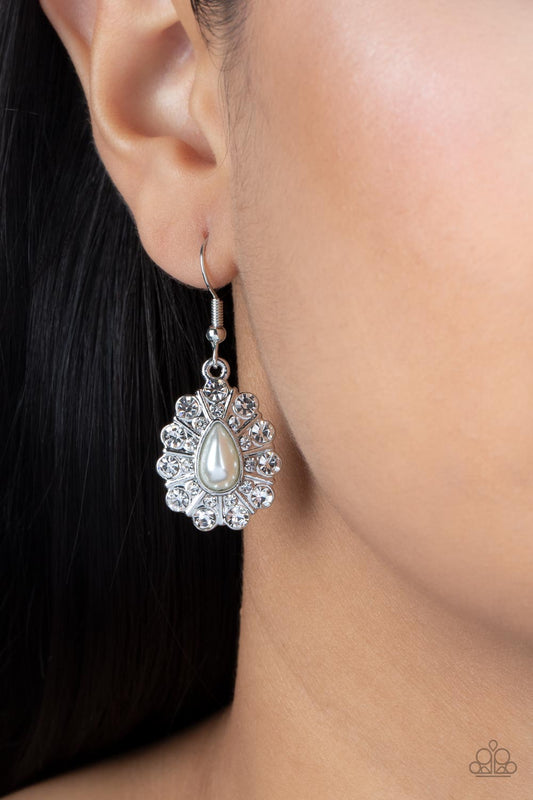 Extroverted Elegance - White Pearl Earrings - Paparazzi Accessories - Dotted in blinding white rhinestones, silver petals flare out from a pearly white teardrop for a timeless twinkle. Earring attaches to a standard fishhook fitting.