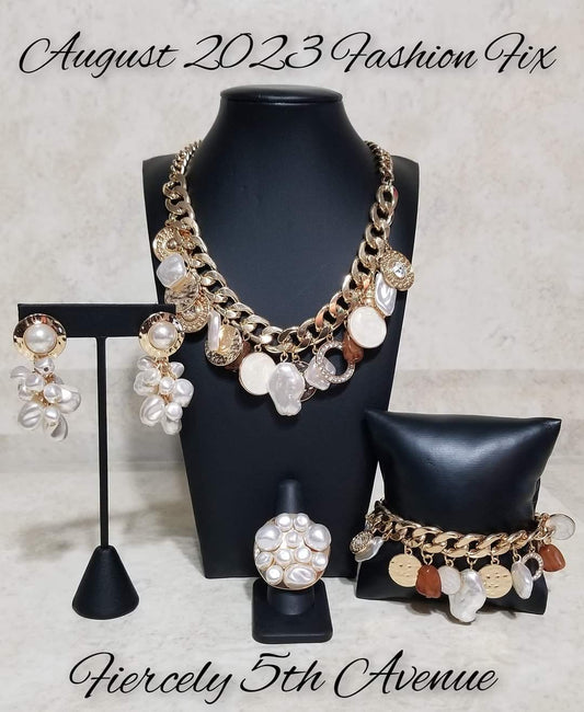 Fiercely 5th Avenue - Fashion Fix Gold Jewelry Set - Paparazzi Accessories - Includes one of each accessory featured in the Fiercely 5th Avenue Trend Blend in August's Fashion Fix:  Now SEA Here - Gold Necklace  Long Time No SEA - Gold Post Earrings  SEA For Yourself - Gold Bracelet SEA Reason - Gold Ring  Timeless and classic yet sophisticated and versatile, the Fiercely 5th Avenue Collection features elegant designs and traditional metal finishes.