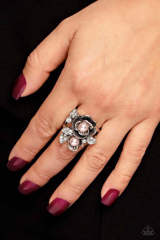 Fine-BLOOMING - Pink and Silver Ring - Paparazzi Accessories - Rippling in ornate detail, folds of silver petals with pink pearl centers bloom atop the finger for a seasonal look. White rhinestone-encrusted silver leaves peek out from the airy floral display for additional sheen and glitz.
