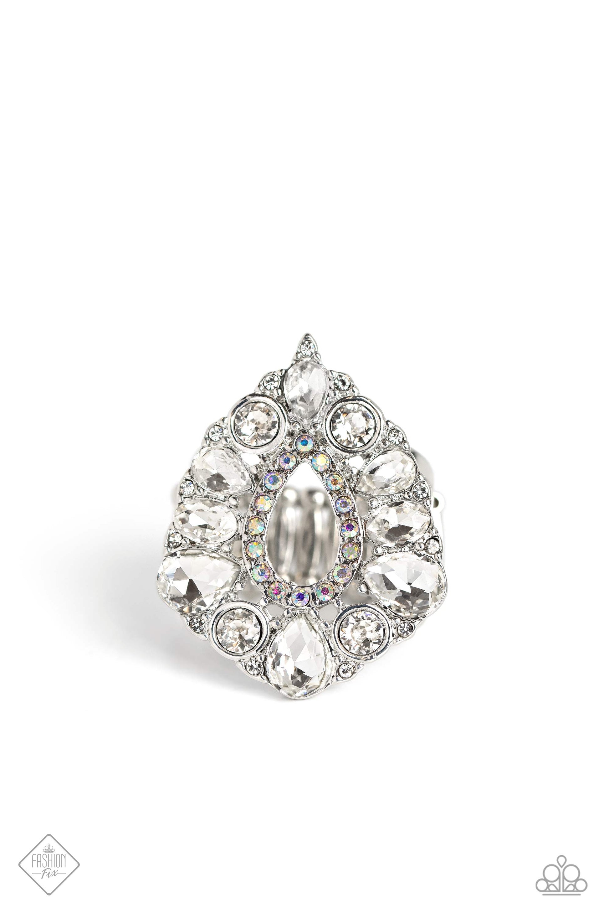First Class Fairytale - White and Silver Ring - Paparazzi Accessories - A large teardrop frame, surrounded by borders of white round and teardrop gems and dainty iridescent sparkle stands out atop the finger on airy silver bands for a fairytale finish. Due to its prismatic palette, color may vary. Features a stretchy band for a flexible fit. Sold as one individual ring.