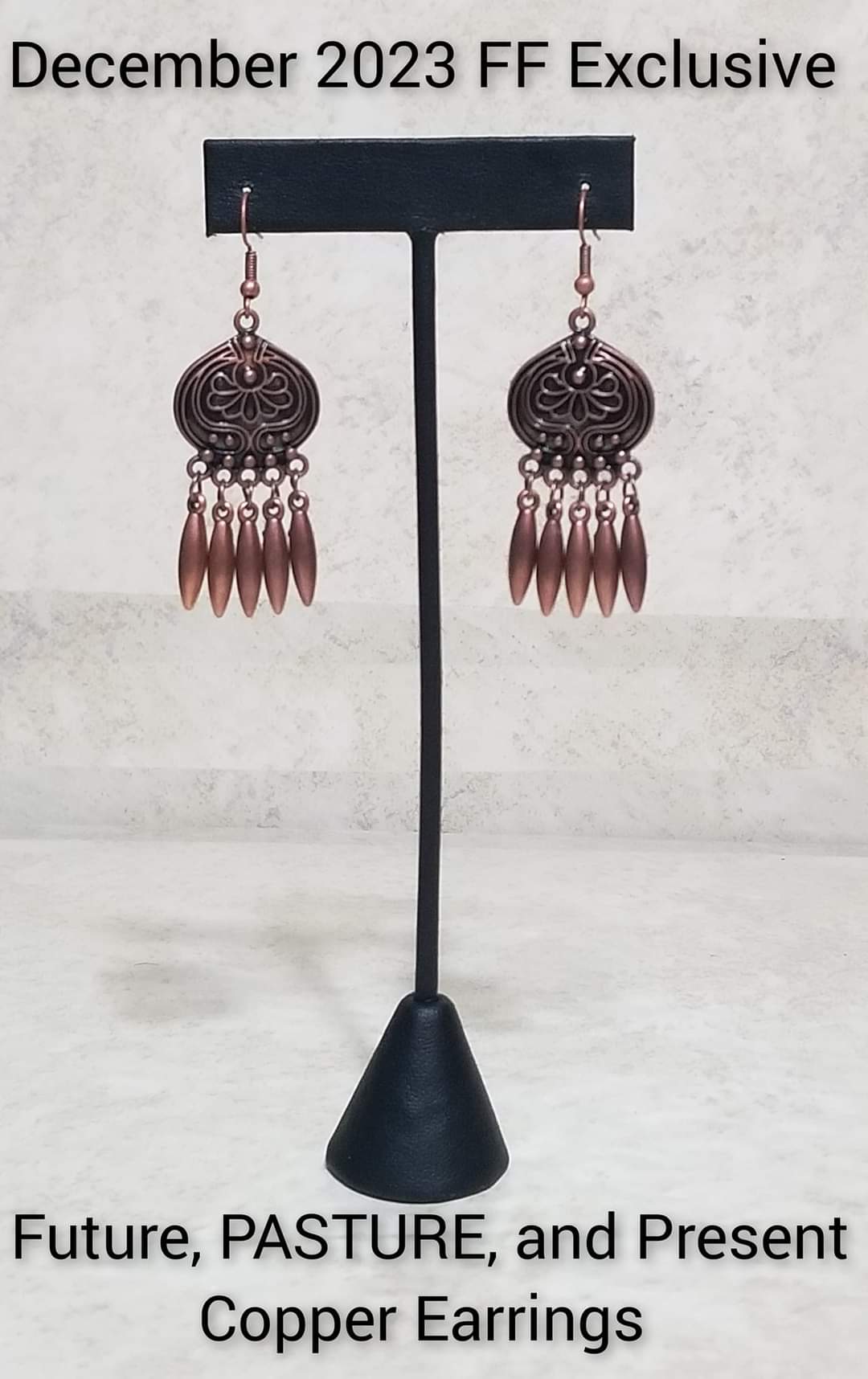 Future, PASTURE, and Present - Copper Earrings - Paparazzi Accessories - Embossed in a rustic floral pattern, a round studded copper frame gives way to a fringe of oblong copper beads for a noise-making finish.