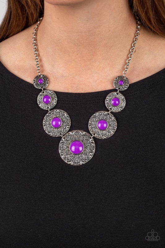 Garden Glade - Purple and Silver Necklace - Paparazzi Accessories - Dotted with Dahlia beaded centers, floral embossed silver discs gradually increase in size as they link below the collar for a flowery pop of color necklace.