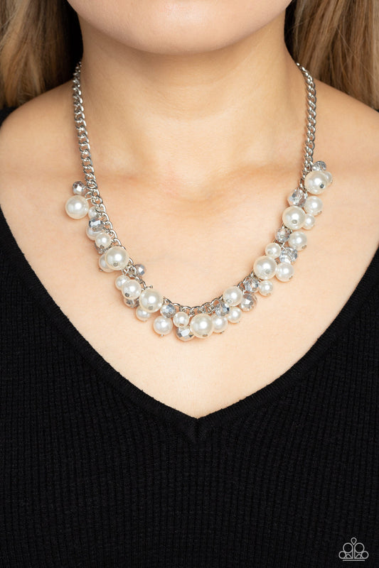 Glinting Goddess - White Pearl and Silver Necklace - Paparazzi Accessories - A faceted collection of glassy, silver crystal-like beads and classic white pearls in varying sizes flickers and flashes below the collar on a thick silver curb chain for a refined shimmer.