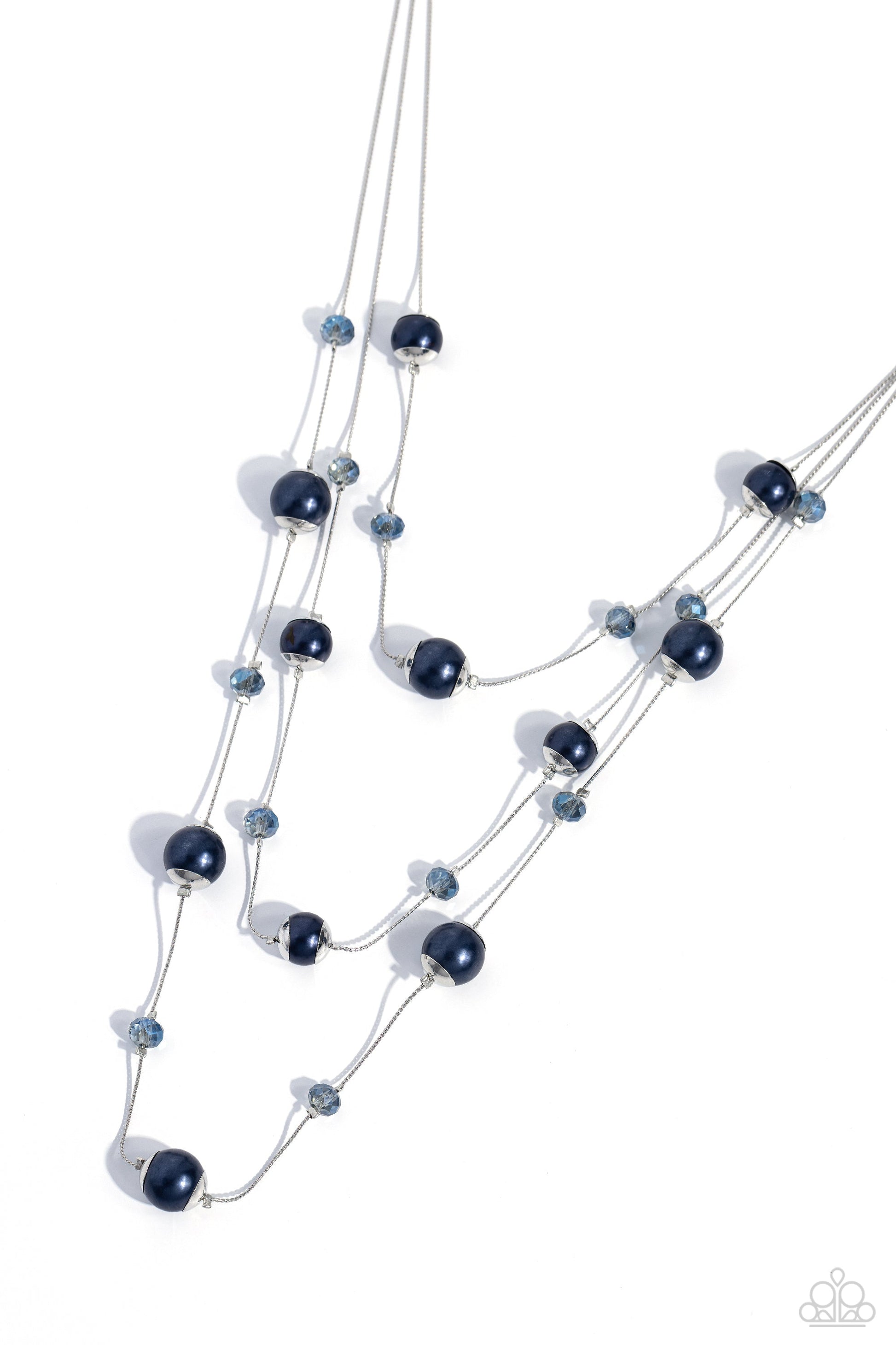 Glistening Gamut - Blue and Silver Necklace - Paparazzi Accessories - Three strands of lengthened silver chains are adorned with soft navy pearls in silver cap fittings and glassy blue reflective beads for an eye-catching statement down the chest.