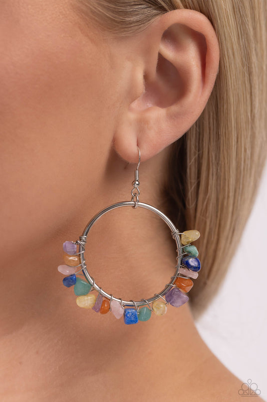 Handcrafted Habitat - Multi Color Earrings - Paparazzi Accessories - A colorful collection of chiseled jade, amethyst, lapis, turquoise, rose quartz, and other multicolored stones are wrapped along the bottom of a shiny, silver hoop by shimmery silver wire for a handcrafted, earthy finish.