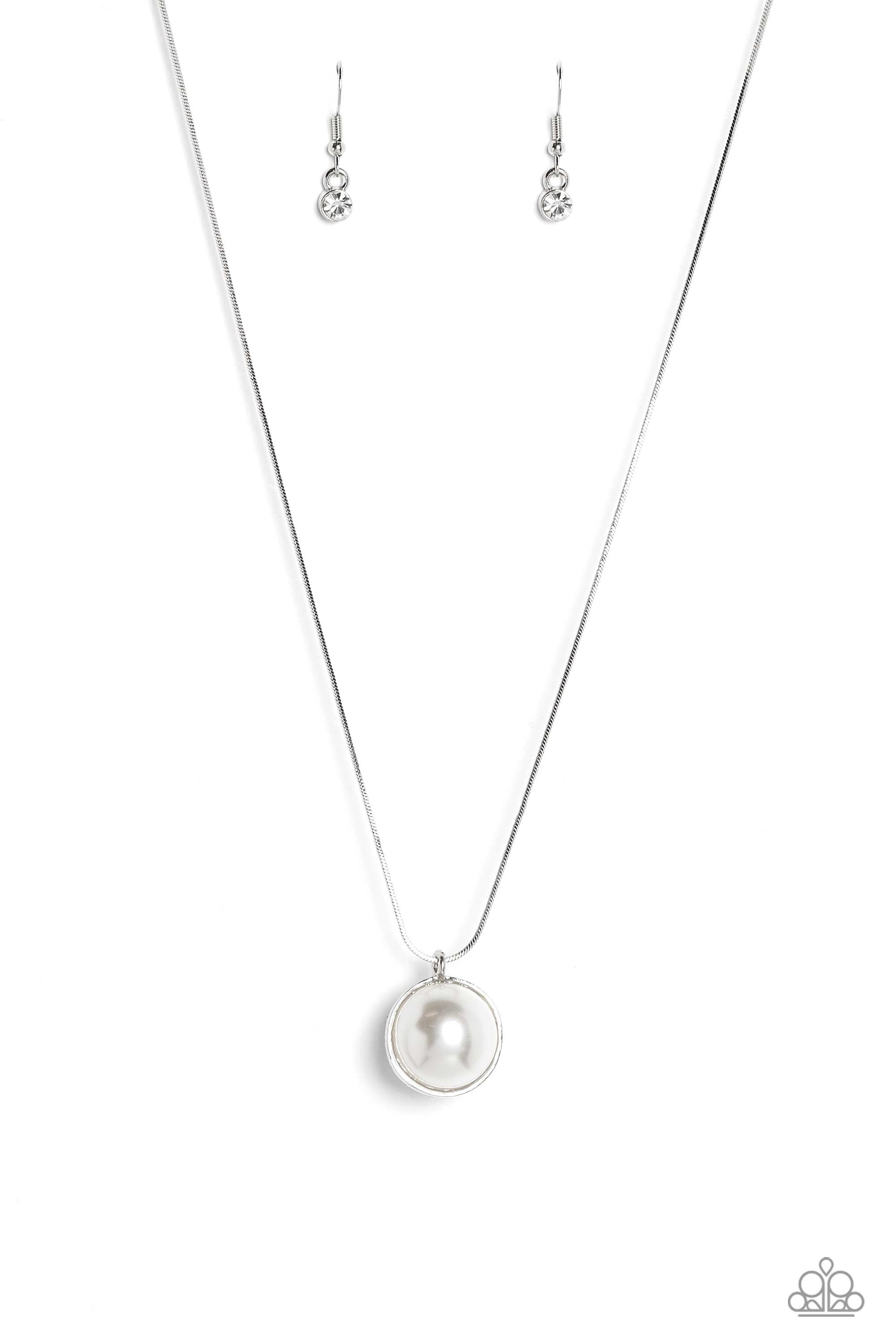 Haute Hybrid - White Pearl and Silver Necklace - Paparazzi Accessories - Cascading from a shiny silver snake chain, a sparkly white rhinestone-encrusted ornament and a classic white pearl meet to create a half-and-half refined pendant.
