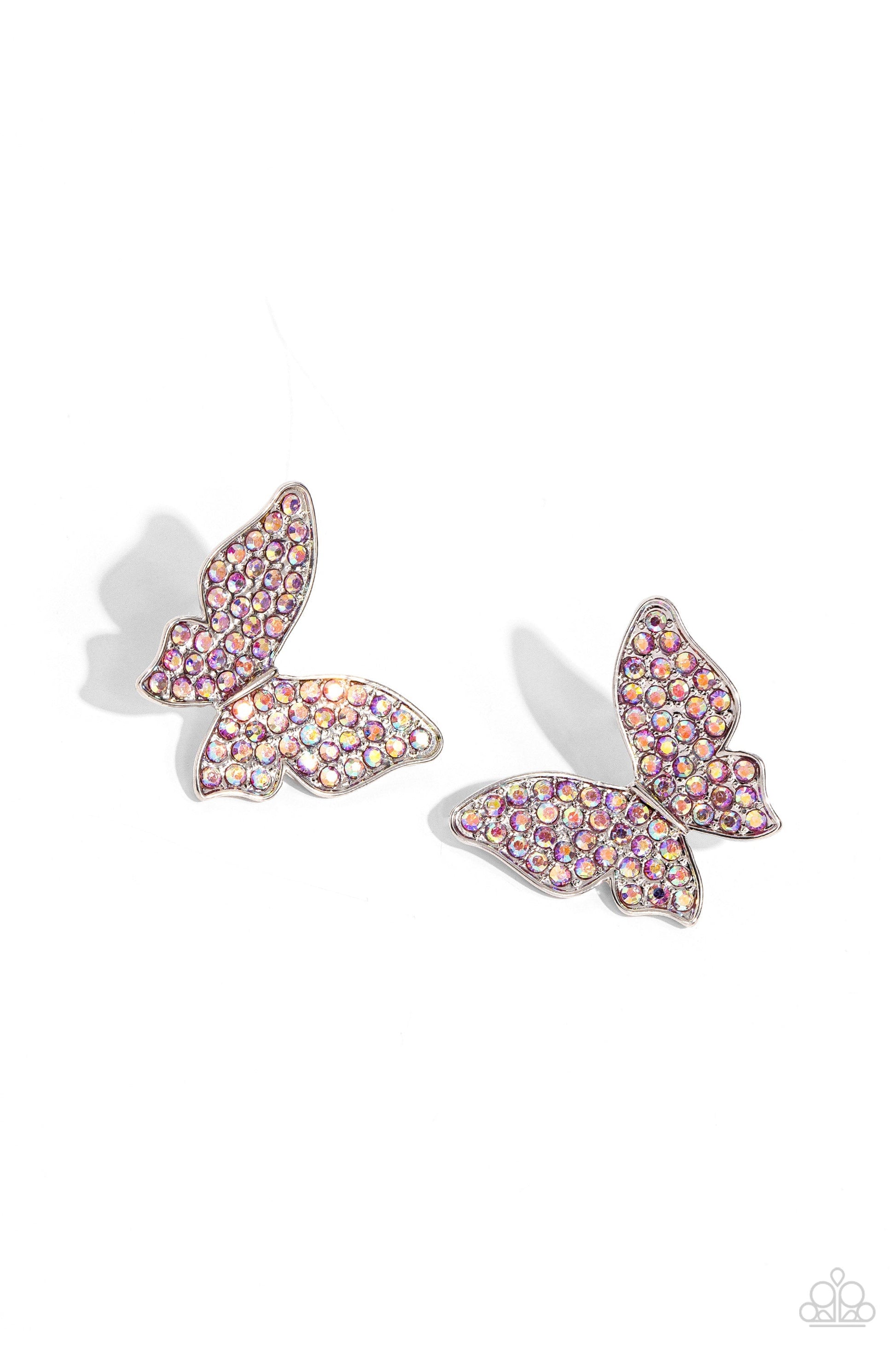High Life - Pink Butterfly Earrings - Paparazzi Accessories - Featuring a tilted motif, a silver butterfly encrusted with an explosion of pink iridescent rhinestones sparkles at the ear for an enchanting fashion. Earring attaches to a standard post fitting. Due to its prismatic palette, color may vary. Sold as one pair of post earrings.