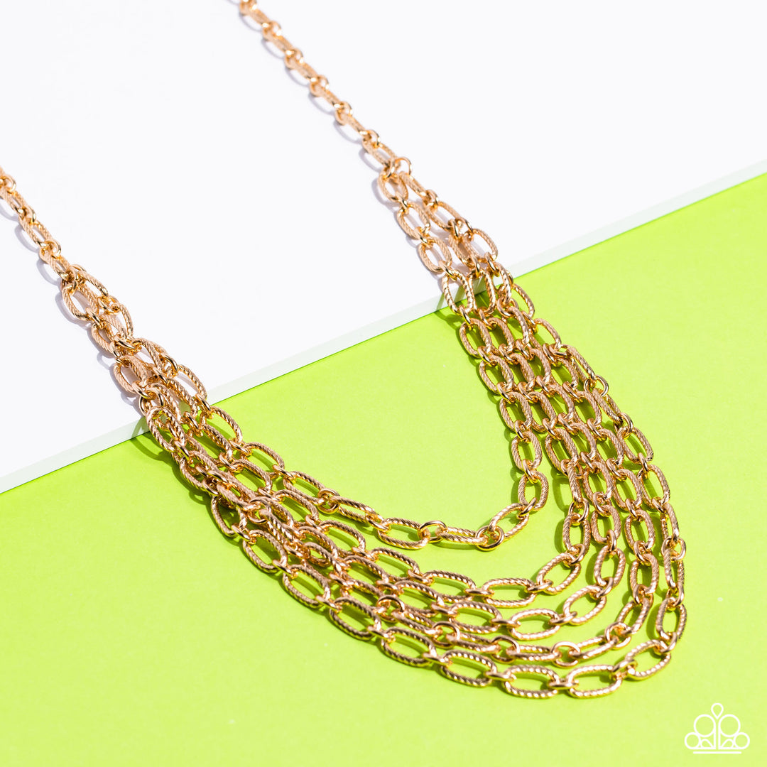 House of Chain - Gold Necklace - Paparazzi Accessories - A strand of textured gold links gives way to layers of identical chains that drape across the chest in a stunning industrial display. The textured links catch and reflect the light at every angle, adding breathtaking shimmer to the monochromatic design. Features an adjustable clasp closure. Sold as one individual necklace.