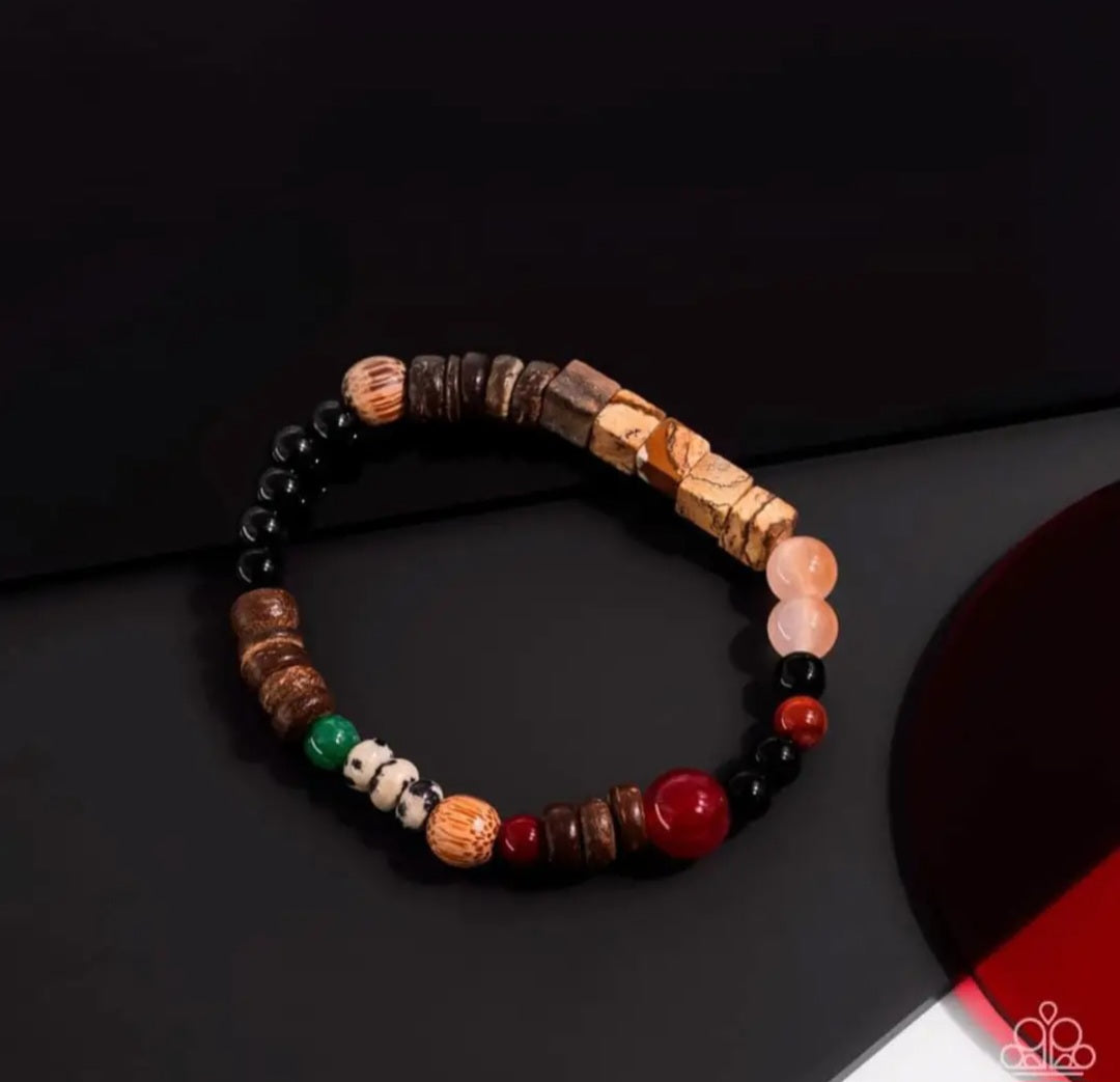 I WOOD Be So Lucky - Orange Unisex Bracelet - Paparazzi Accessories - Infused along a stretchy band around the wrist, a strand of colorful glassy, stone, and acrylic beads joins a spotted collection of wood beads for a colorfully urban look bracelet.