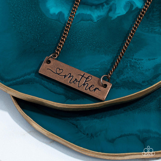 Joy Of Motherhood - Copper Necklace - Paparazzi Accessories - Stamped in a heart and the word, "Mother," an antiqued copper plate is suspended by a classic copper chain below the collar, creating a whimsy sentimental pendant. Features an adjustable clasp closure.