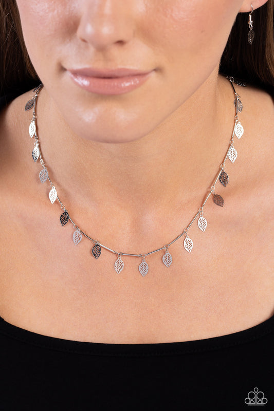 LEAF a Light On - Silver Necklace - Paparazzi Accessories - Skinny silver bars link together along the collar to create a dainty display of metallic sheen. A shiny silver leaf separates each bar, bringing shimmery movement to the lightweight design. Features an adjustable clasp closure.