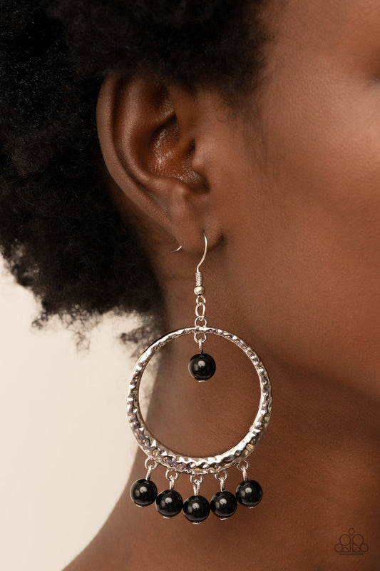 Luscious Luxury - Black and Silver Earrings - Paparazzi Accessories - A single black bead swings from the top of a hammered silver hoop. Matching black beads dance from the bottom of the hoop, creating a bubbly fringe. Earring attaches to a standard fishhook fitting. Sold as one pair of earrings.