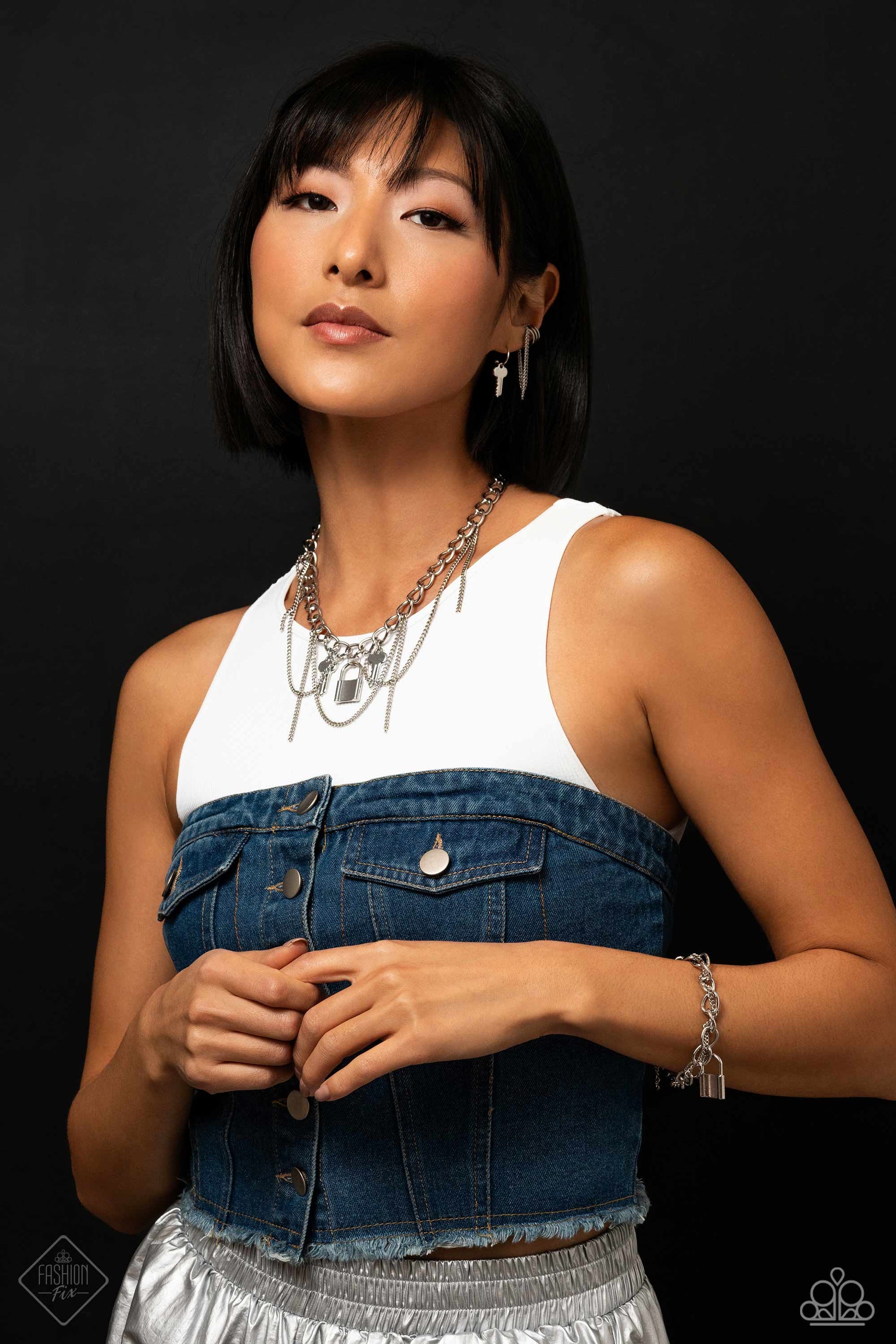 Magnificent Musings - Silver Jewelry Set - Paparazzi Accessories - Includes one of each accessory featured in the Magnificent Musings Trend Blend in January's Fashion Fix: Against the LOCK - Silver Necklace, Unlocked Perfection - Silver Cuff Earrings, The Key to Everything - Silver Hoop Earrings, and Watch the LOCK - Silver Bracelet.