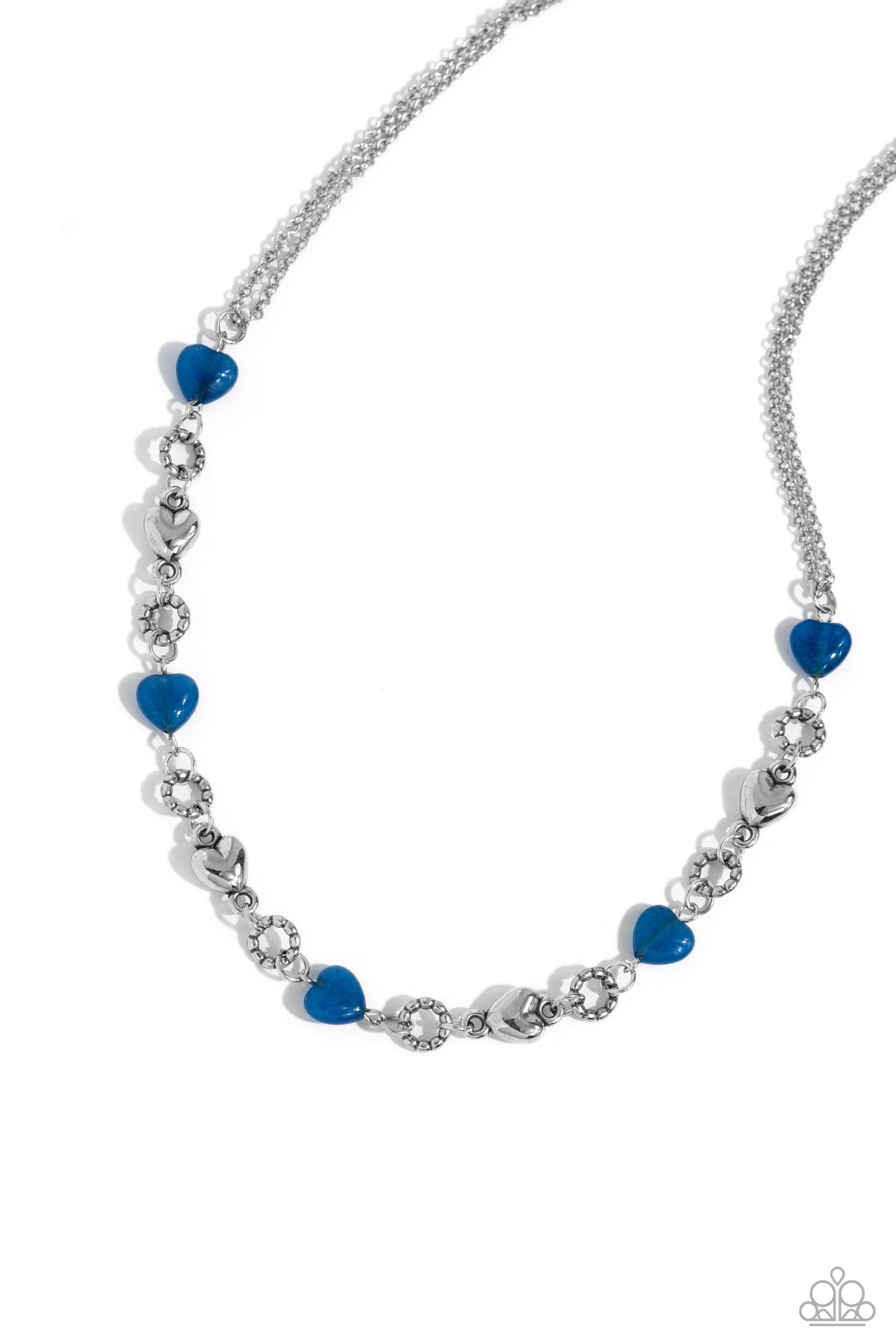 My HEARTBEAT Will Go On - Blue and Silver Necklace - Paparazzi Accessories - Heart-shaped lapis stones and sleek silver hearts alternate along the neckline from a double strand of shimmery silver chains. Bubbly textured silver rings separate each heart shape infusing the romantically earthy design with a touch of high-sheen detail.