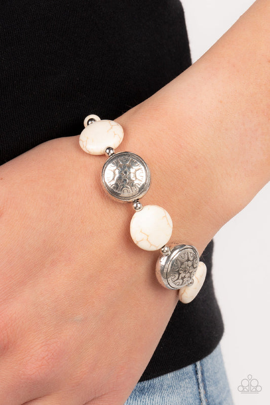 Oasis Orchard - White and Silver Bracelet - Paparazzi Accessories - Infused with silver beads and white stone accents, flat white stone beads alternate with floral silver frames along an invisible wire around the wrist for an earthy pop of color. Features an adjustable clasp closure. Sold as one individual bracelet.